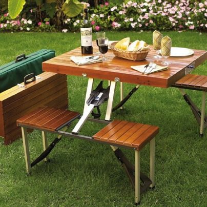 A Wooden Picnic Table That Folds Into A Carrying Case