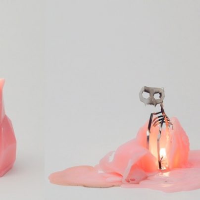 PyroPet – A Cute Cat Candle That Melts Into A Creepy Skeleton