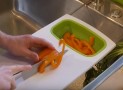 Over The Sink Cutting Board Helps Keep Your Kitchen Clean