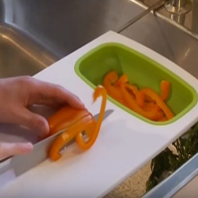 Over The Sink Cutting Board Helps Keep Your Kitchen Clean