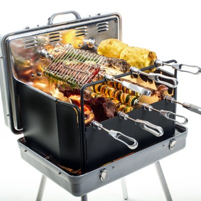 A Portable Briefcase That Turns Into A Brazilian Rotisserie Grill