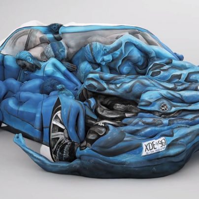Body Painted Models Form A Crashed Car