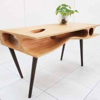A Table With A Built-In Tunnel For Cats
