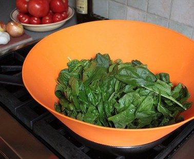 The Frywall Keeps the Splatter Inside Your Pan When You Cook