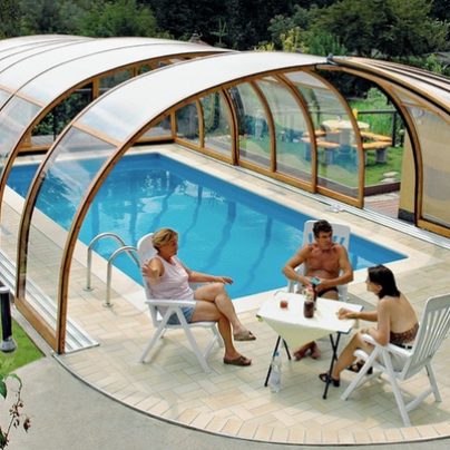 You Can Have an Outdoor and Indoor Pool with This Enclosure