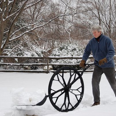 A Wheeled Snow Shovel