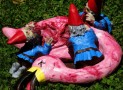 Zombie Gnomes Eating A Pink Flamingo